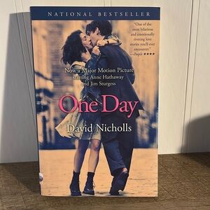 ONE DAY by David Nicholls 
Blue Bestseller Book Cover with Romantic Silhouette